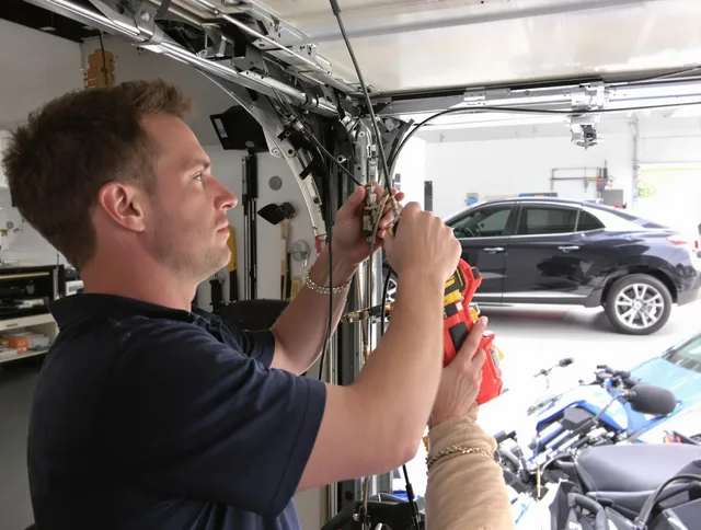 Horizon West Garage Door Repair safety certified technician performing cable replacement in Horizon West