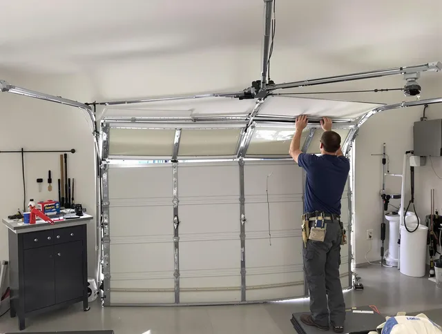 Horizon West Garage Door Repair specialist performing precise section replacement on Horizon West garage door