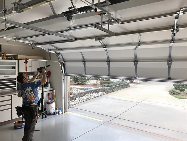 Garage door track repair service by Horizon West Garage Door Repair in Horizon West